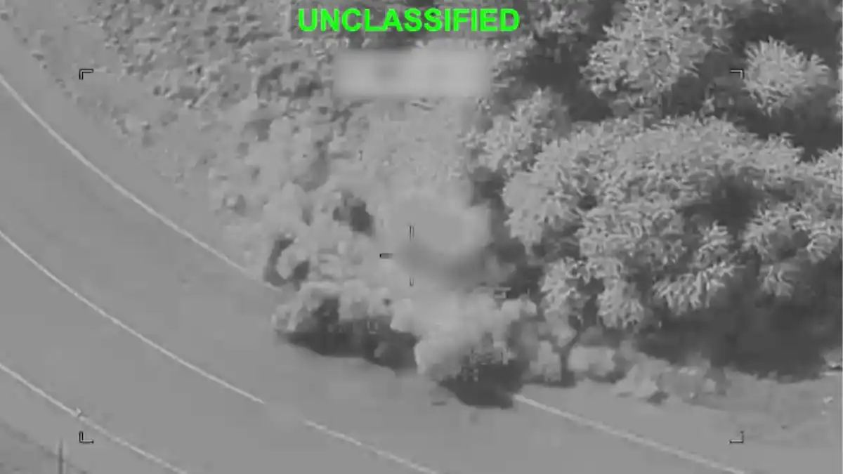 Screengrab from U.S. Central Command video showing a precision strike near a roadside area in Iran on July 16, 2026.